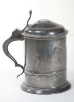 A LATE 19TH CENTURY UNUSUAL WRIGGLE WORK PEWTER TANKARD, with domed cover and scroll thumb piece,