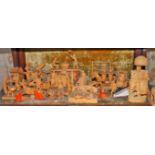 A UNIQUE COLLECTION OF CHINESE SANDALWOOD FIGURES AND GROUPS, modelled with figures in genre scenes,