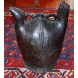 AN EARLY ENGLISH STITCHED LEATHER BLACK JACK, or jug with double opening, 14" (35cm).