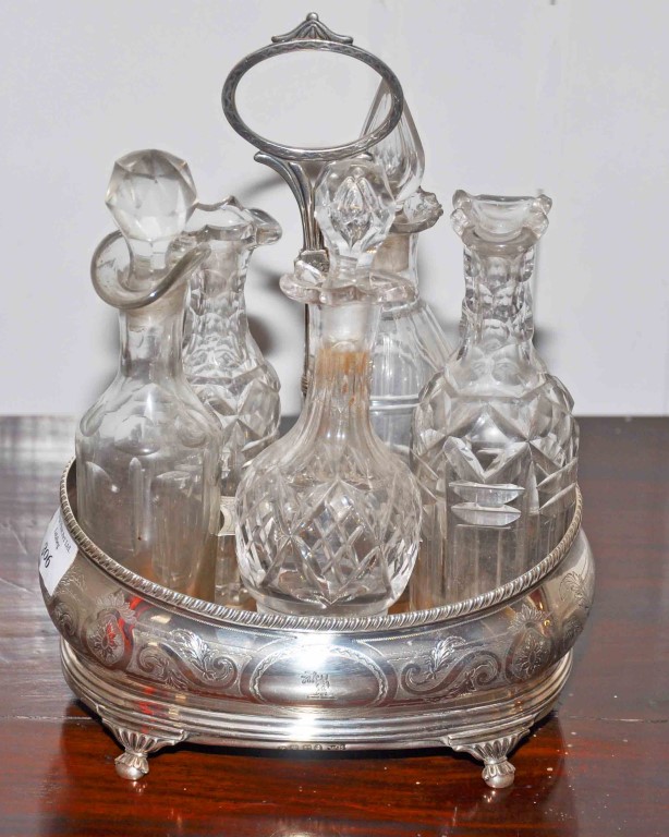 A GEORGE III SILVER CRESTED BRIGHT CUT CRUET STAND, in the Adam's style,