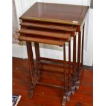 A FINE NEST OF FOUR RECTANGULAR BRASS MOUNTED AND BRASS INLAID OCCASIONAL TABLES,