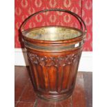 A HEAVY GOTHIC STYLE BRASS BOUND PEAT BUCKET, with brass swing handle,