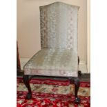 AN IRISH MAHOGANY SIDE CHAIR, 19th century, with arched and padded back and padded seat,