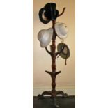 TWO SIMILAR WILLIAM IV PERIOD MAHOGANY HAT AND COAT STANDS,