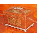 A REGENCY PERIOD BRASS INLAID ROSEWOOD TEA CADDY, of sarcophagus form, with divided interior,