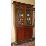 A 19TH CENTURY MAHOGANY BOOKCASE, in the Gothic style, the top George IV period,