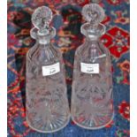 A PAIR OF FERN ENGRAVED CUT GLASS DECANTERS, probably Pugh of Dublin, each with target stopper, 11.