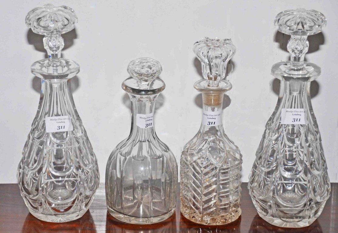 A PAIR OF CUT GLASS DECANTERS AND STOPPERS, late 19th century, each 12" (31cm),