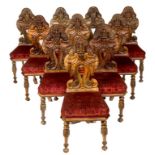 A VERY UNUSUAL SET OF ELEVEN IRISH 19TH CENTURY WALNUT CRESTED SIDE CHAIRS,