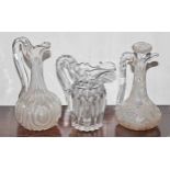 A 19TH CENTURY CUT GLASS WATER JUG, 9" (23cm); together with a 19th century cut glass claret jug,