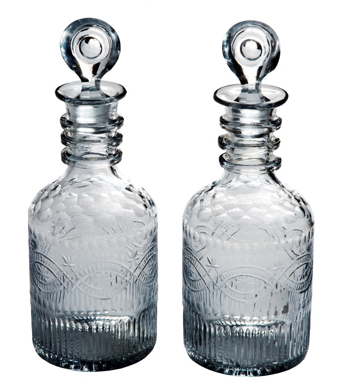 A PAIR OF 19TH CENTURY GUT GLASS DECANTERS, by the Cork Glass Company,