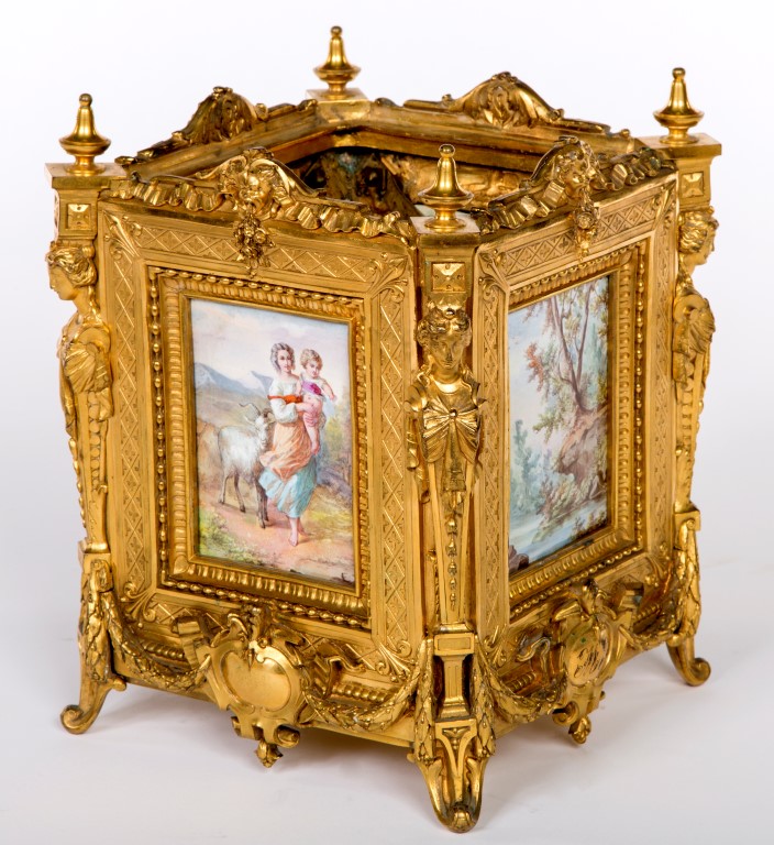 A FINE SQUARE ORMOLU JARDINIERE, late 19th century, with four hand painted enamel panels,