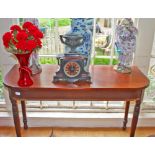 A MAHOGANY GEORGE IV SIDE TABLE, with the D shaped top raised on ring turned legs, 46" (117cms),