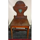 A VERY GOOD PAIR OF LATE GEORGE III PERIOD CRESTED MAHOGANY HALL CHAIRS,