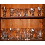 A SET OF SEVEN EARLY 19TH CENTURY CORK VASE SHAPED GLASSES, each on stem base 4.