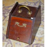 AN EDWARDIAN BRASS MOUNTED SLOPE FRONT COAL SCUTTLE, together with a walnut bedside pedastel,