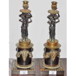 A PAIR OF BRONZE AND GILT BRONZE FIGURAL CANDLESTICKS, 19th century,