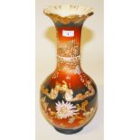 A JAPANESE SATSUMA VASE, early 20th century, decorated with flowers, on a rust ground, 18.