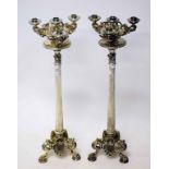 A PAIR OF ATTRACTIVE TALL SILVER PLATED THREE BRANCH FOUR LIGHT CANDELABRA,