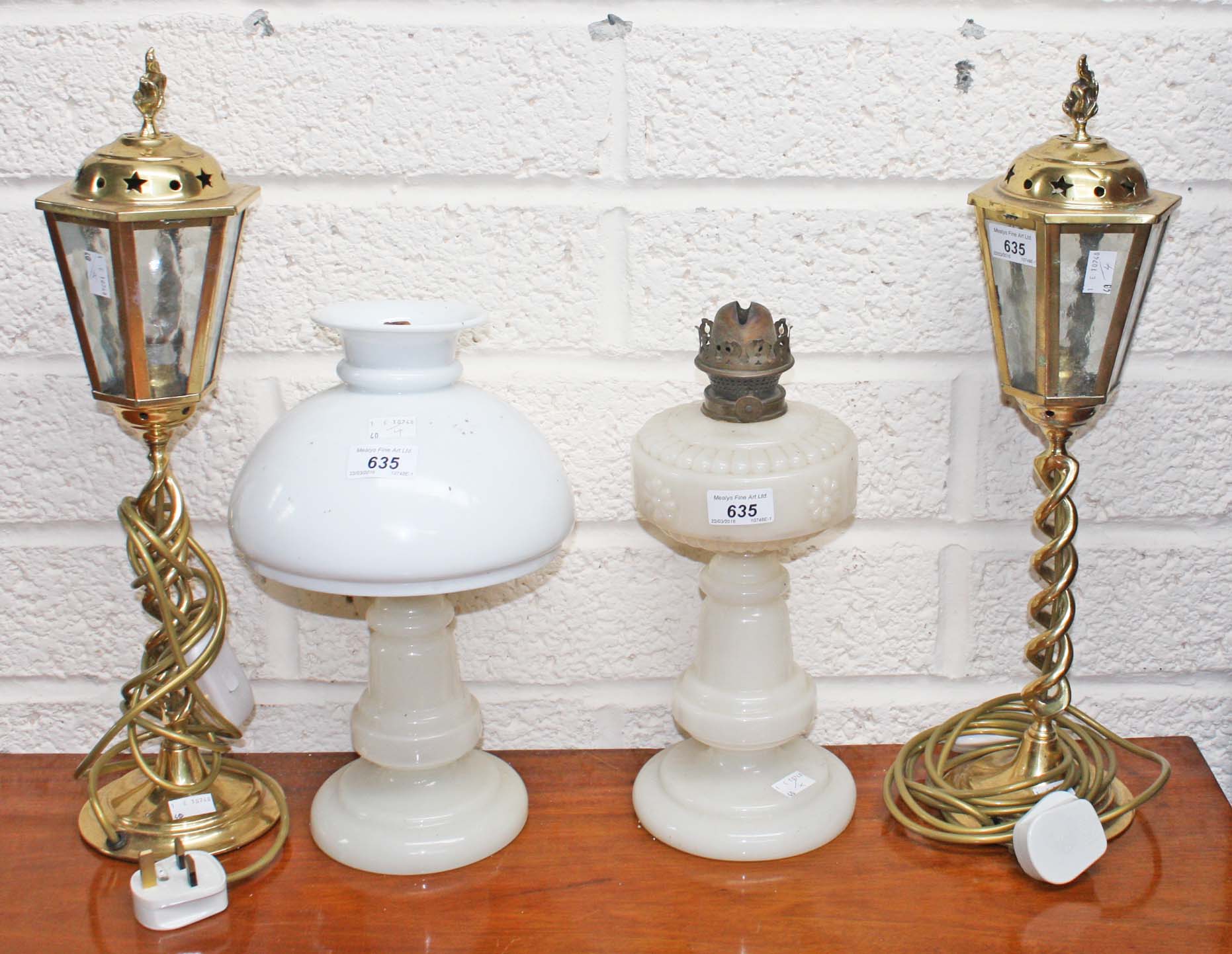 TWO MOULDED MILK GLASS OIL LAMPS, late 19th century,