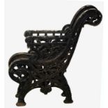A PAIR OF VICTORIAN CAST IRON GARDEN BENCH ENDS, each cast with scrolling foliage,