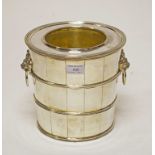A SILVER PLATED CHAMPAGNE OR WINE COOLER, of barrel form, with two lion mask and ring handles,