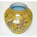 A CHINESE PORCELAIN VASE, in yellow, brown and white, with two five claw dragons, in slight relief,