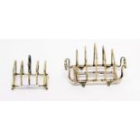 A FOUR COMPARTMENT SILVER TOAST RACK, London 1908, with two handles,