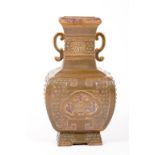 A HEAVY OLIVE GREEN CHINESE PORCELAIN AND RELIEF MOULDED VASE, of rectangular baluster form,