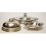 A LARGE OVAL SILVER PLATED SERVING DISH, with glass liner and domed cover,