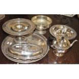 A THREE PIECE SILVER PLATED CELTIC STYLE TEA SERVICE, a circular silver plated tray,