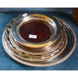 FIVE CIRCULAR SILVER PLATED SALVERS, together with trays of various sizes.