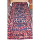 A DARK BLUE GROUND ORIENTAL RUNNER, with all over stylised pattern,