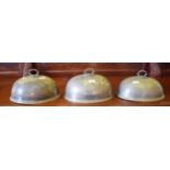 A SET OF THREE 19TH CENTURY OVAL SILVER PLATED DISH COVERS, each with the Duke of Ormonde crest,