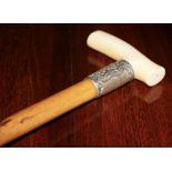 A GOOD MALACCA PRESENTATION HAND STICK, with ivory handle and silver collar, presented to Mr. W.