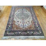 A TURKISH KEYSERI RUG, with all over floral pattern, and a central medallion,