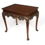 A FINE IRISH MAHOGANY SILVER TABLE, with rectangular dish top, and ornate carved frieze,