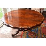 A LARGE IRISH VICTORIAN ROSEWOOD SNAP TOP BREAKFAST OR CENTRE TABLE, by Robert Strahan of Dublin,