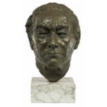 A BRONZED PLASTER HEAD OF A GENTLEMAN, on square veined white marble plinth, 15.5" (39cm)h.