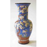 A LARGE RELIEF MOULDED BALUSTER SHAPED SKY BLUE PORCELAIN VASE,