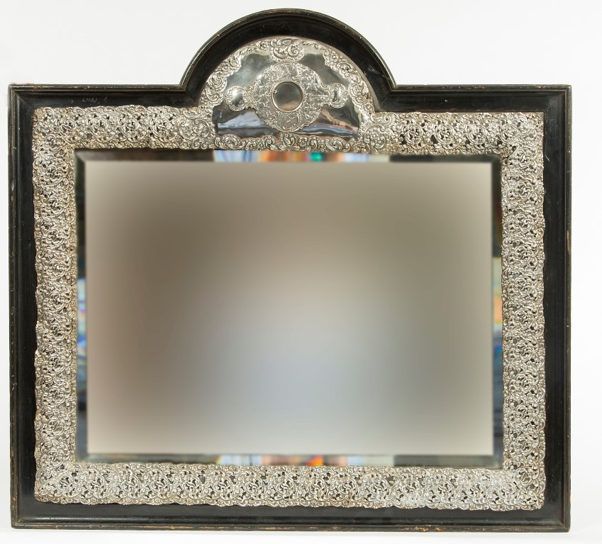 A 17TH CENTURY DUTCH STYLE ARCH TOP SILVER FRAMED MIRROR, with rectangular bevelled plate,