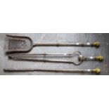 A HEAVY SET OF THREE LATE 19TH CENTURY BRASS FIRE IRONS, comprising shovel tongs and poker,