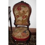 A VICTORIAN WALNUT AND TAPESTRY COVERED OCCASIONAL OR NURSING CHAIR,