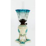 A FIRST PERIOD BELLEEK AMPHORA OIL LAMP, decorated in relief with blue anthemions,
