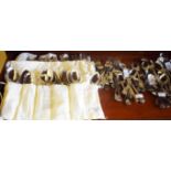 A LARGE QUANTITY OF SHELL AND FIDDLE PATTERN STAINLESS STEEL CUTLERY,