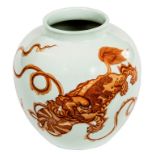 A CHINESE WHITE AND IRON RED PORCELAIN GINGER JAR, decorated with two Fo lions attacking squids, 7.