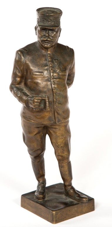 AN EARLY 20TH CENTURY BRONZE FIGURE, of a military figure, with a moustache,