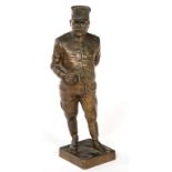 AN EARLY 20TH CENTURY BRONZE FIGURE, of a military figure, with a moustache,