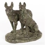 A HEAVY BRONZE GROUP, c.1900, modelled with two German shepherds, on oval rugged base, 16" (40.