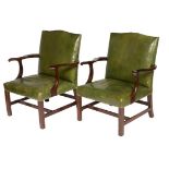 A PAIR OF 18TH CENTURY MAHOGANY GAINSBOROUGH TYPE ARM CHAIRS, each with a hump back,